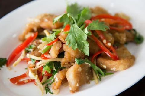 Deep fried Snapper fish with herb Stock Photos