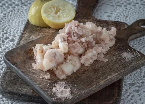 Deep-Fried Squid or Deep-Fried Calamari with Lamon and Himalayan Salt Stock Photos