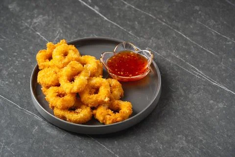 Deep fried squid rings Stock Photos