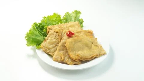 Deep fried tempeh or Tempe goreng is a traditional food from Indonesia Stock Photos