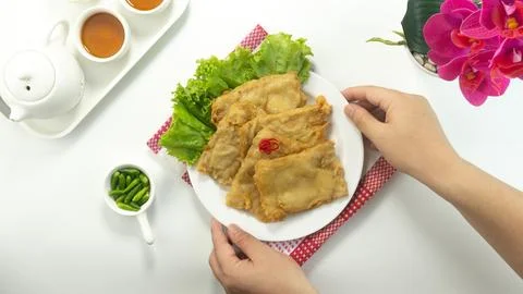 Deep fried tempeh or Tempe goreng is a traditional food from Indonesia Stock Photos