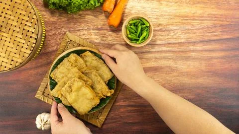Deep fried tempeh or Tempe goreng is a traditional food from Indonesia Foto stock