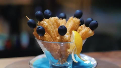 Deep-fried tiger prawns with olives with red sauce Stock Footage 202008751