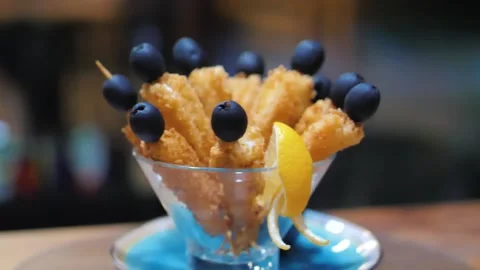 Deep-fried tiger prawns with olives with red sauce Stock Footage 202212853