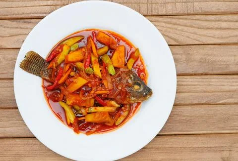 Deep Fried Tilapia Fish topped Sweet Stock Photos