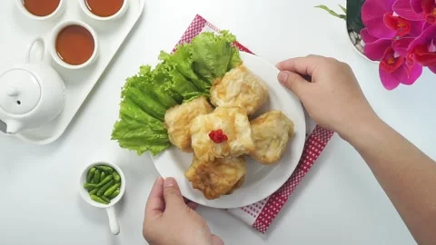 Deep fried Tofu or Tahu goreng is a traditional food from Indonesia Stock Footage 243798924