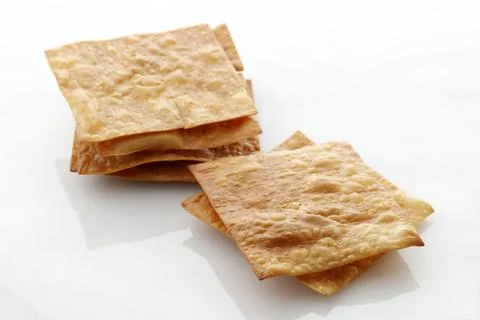 Deep Fried WOnton Sheet Isolated on White Background, Asian Popular Side Di.. Stock Photos
