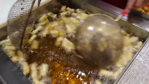 Deep Frying Authentic Korean Fish Cakes (Eomuk) - Korean Street Food Stock Footage 337373107
