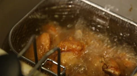 Deep Frying Chicken Pieces Stock Footage 42711140