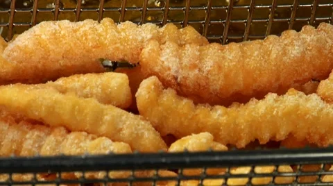 Deep-frying chips Stock Footage 8572336