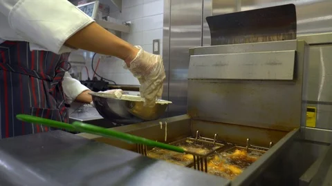 Deep frying fish Video stock 101298863