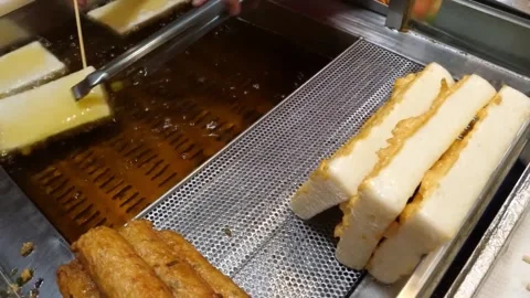 Deep-frying Korean Fish Cake (Eomuk) Street Food Video Stock Footage 337373178