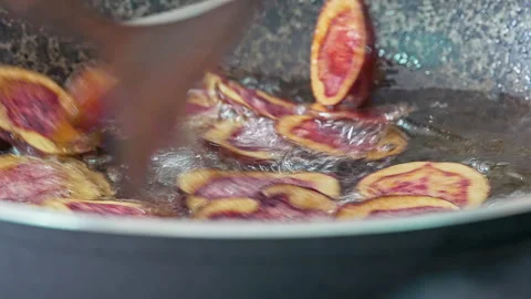 Deep frying native Peruvian potato slices. Stock Footage 341440613