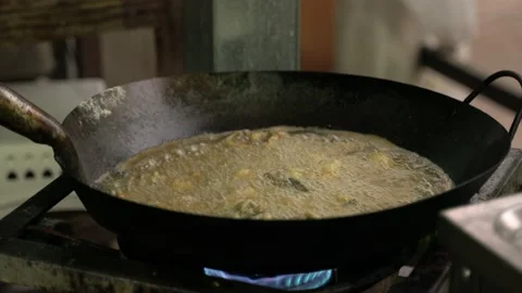 Deep frying oil cooking process Stock Footage 150300444