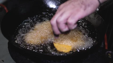 Deep Frying Panko-Breaded Pork in Hot Oil Wok Cooking Stock Footage 337768759