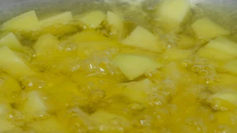 Deep Frying Potato Cubes Stock Footage 127670111