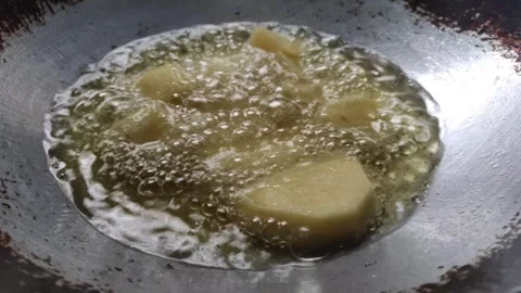 Deep Frying Potato Pieces Stock Footage 319726488