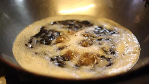 Deep frying potatoes Stock Footage 131702328