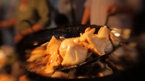Deep frying samosa in a big pan, Indian street food, Mumbai, India Stock Footage 127105889