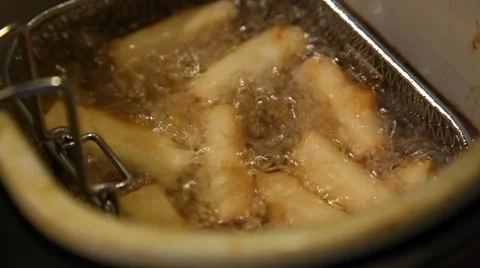 Deep Frying Spring Rolls Stock Footage 42711076