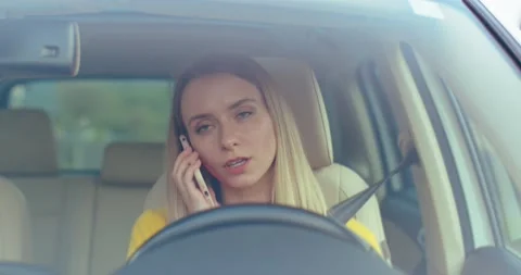 Deep in gadget. Front view of the caucasian blonde woman chatting at the Stock Footage 157360171