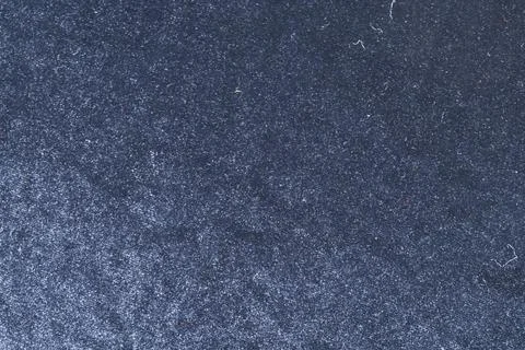 Deep gray texture resembling rough stone or metallic painted surface with fine Stock Photos