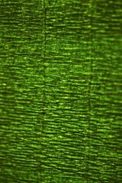 Deep green background texture with dark waves Stock Photos
