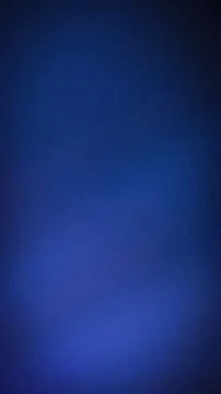 Deep navy blue grainy gradient background with dark vignette for elegant lu.. Stock Photos