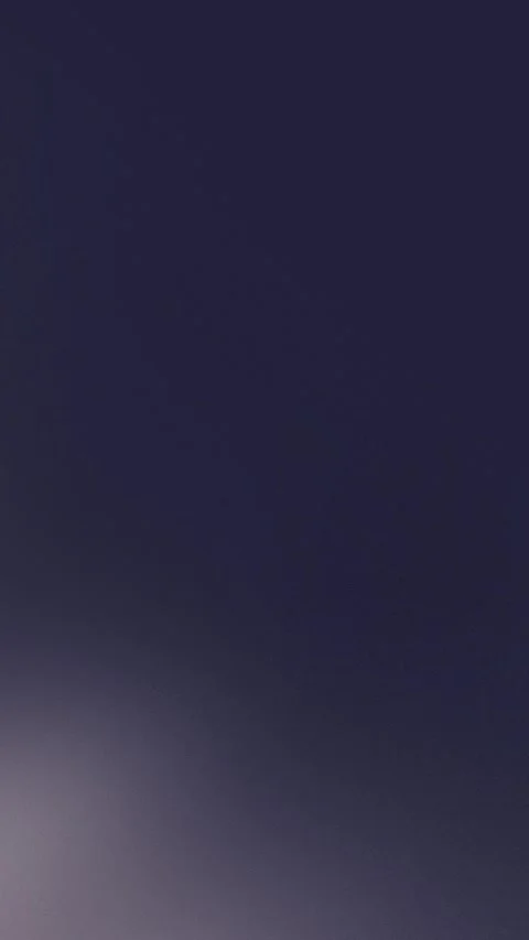 Deep navy to soft gray gradient seamless loop background. 4K texture. Stockbeeldmateriaal 309701177