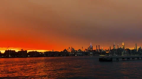 Deep orange air pollution over Manhattan skyline from wildfires. Midtown Stock Footage 338310496