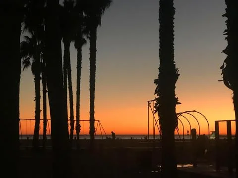Deep orange sunset on the beach Stock-Fotos
