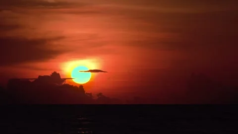 Deep Orange Sunset With Dramatic Clouds Above a Dark Tropical Sea Horizon Vídeo Stock 342089408