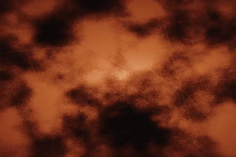Deep orange textured smoke background with gritty film scratches and vintag.. Stock Photos