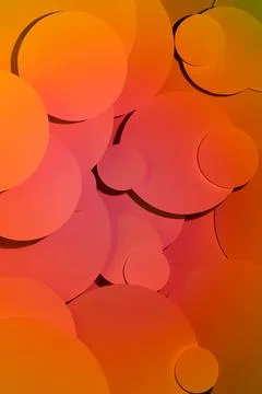 Deep orange yellow pink gradient abstract background of soar paper circles pa Stock Photos