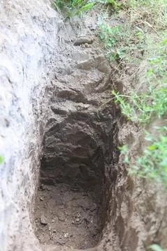 Deep pit in the ground Stock Photos