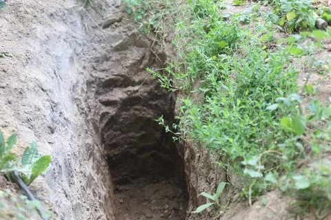 Deep pit in the ground Stock Photos