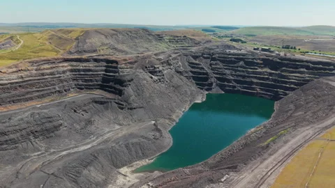 Deep Pit with Water at Closed Ffos-y-Fran Mine, Merthyr Tydfil, Drone Shot Видео 341583989