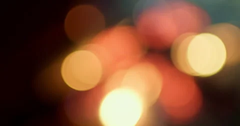 Deep red colored bokeh abstract background. Filmed with real lens. Stock Footage 131540492