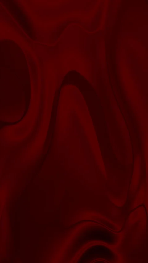 Deep red fabric drapes in soft elegant waves. 스톡 동영상 297508540