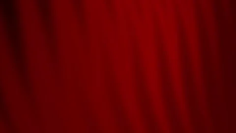 Deep red fabric exhibits vertical folds creating subtle texture. Stock Footage 296226943