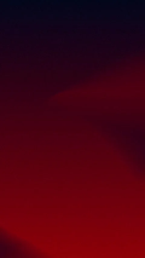 Deep red gradient with a smooth, curved transition to dark blue. Seamless loop Vidéo 309701264