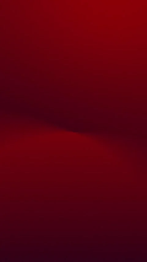 Deep red gradient with soft curves. Seamless loop background. 4K. Видео 309701542