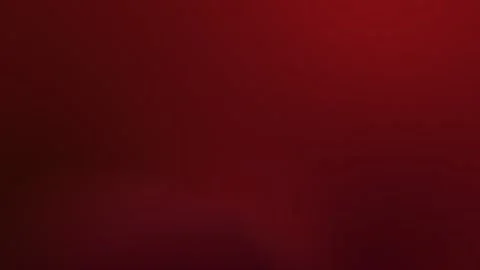Deep red gradient with soft light transitions, seamless loop background, 4K. Vidéo 309700795