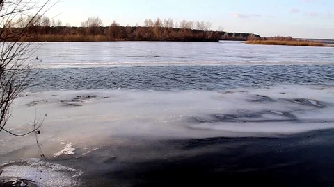 Deep river on the eve of ice drift in the spring in March. Video stock 109167679