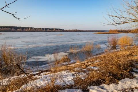 Deep river on the eve of ice drift in the spring in March. Stock Photos
