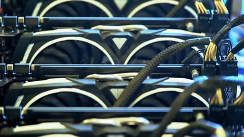 Deep rows of graphics cards form a dense open GPU mining array Stock-Footage 346945512