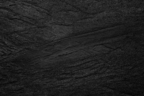 Deep scuffed black concrete texture Stock Photos