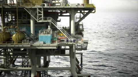 Deep sea oil extraction platform teeming with crew and complex piping systems Stock Footage 332167371