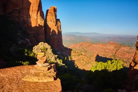 Deep shadows fall across orange rocks at Bell Rock Stock Photos