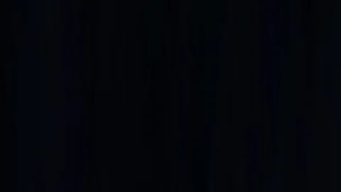 Deep, solid burgundy gradient background. 動画素材 302820810